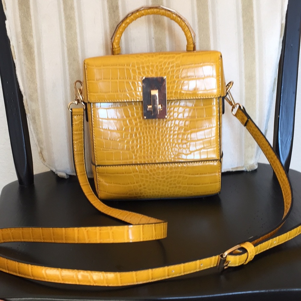 Gold/yellow colored purse